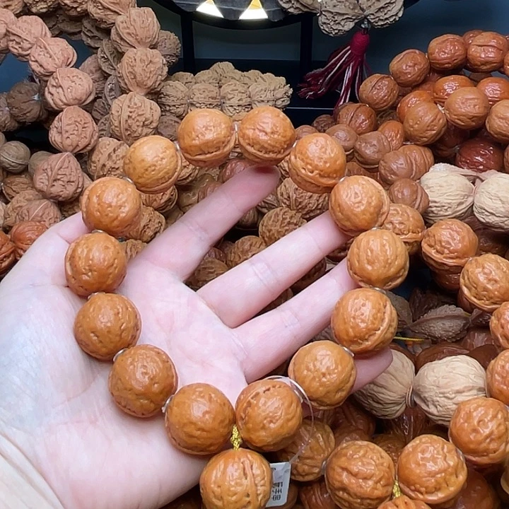 木***军手串文玩核桃光头