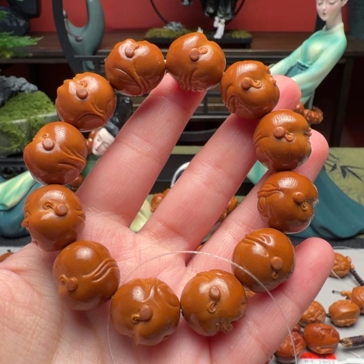 揪***咪手串/手链橄榄核百态