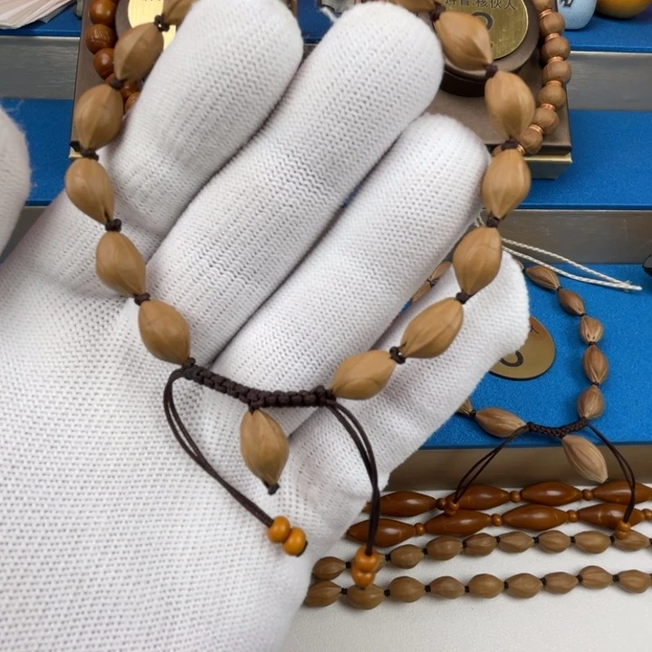 尤***娅手串橄榄核闪电购3