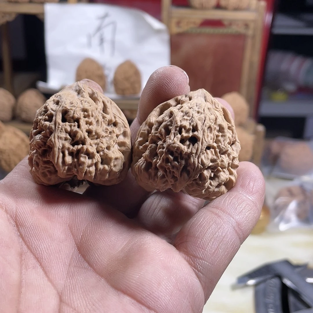 桃核吊坠皮****脚文玩核桃南将石