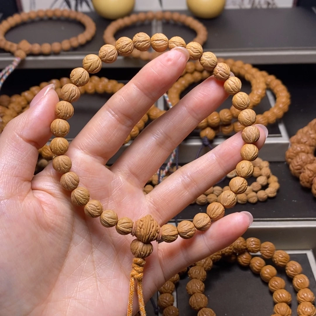 张***曦桃核手串秦岭桃核