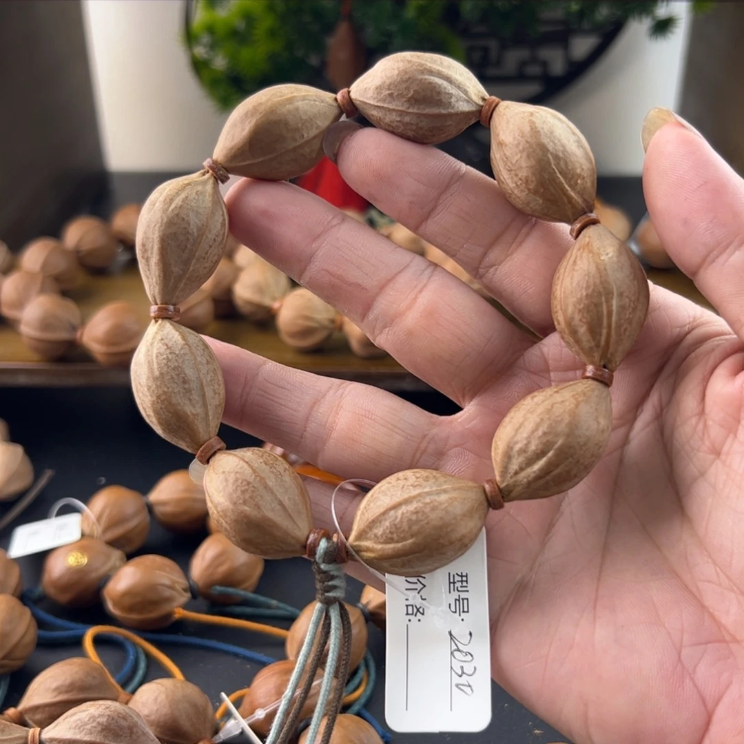 橄榄核吊坠梅林铁核老树核素串文玩2030