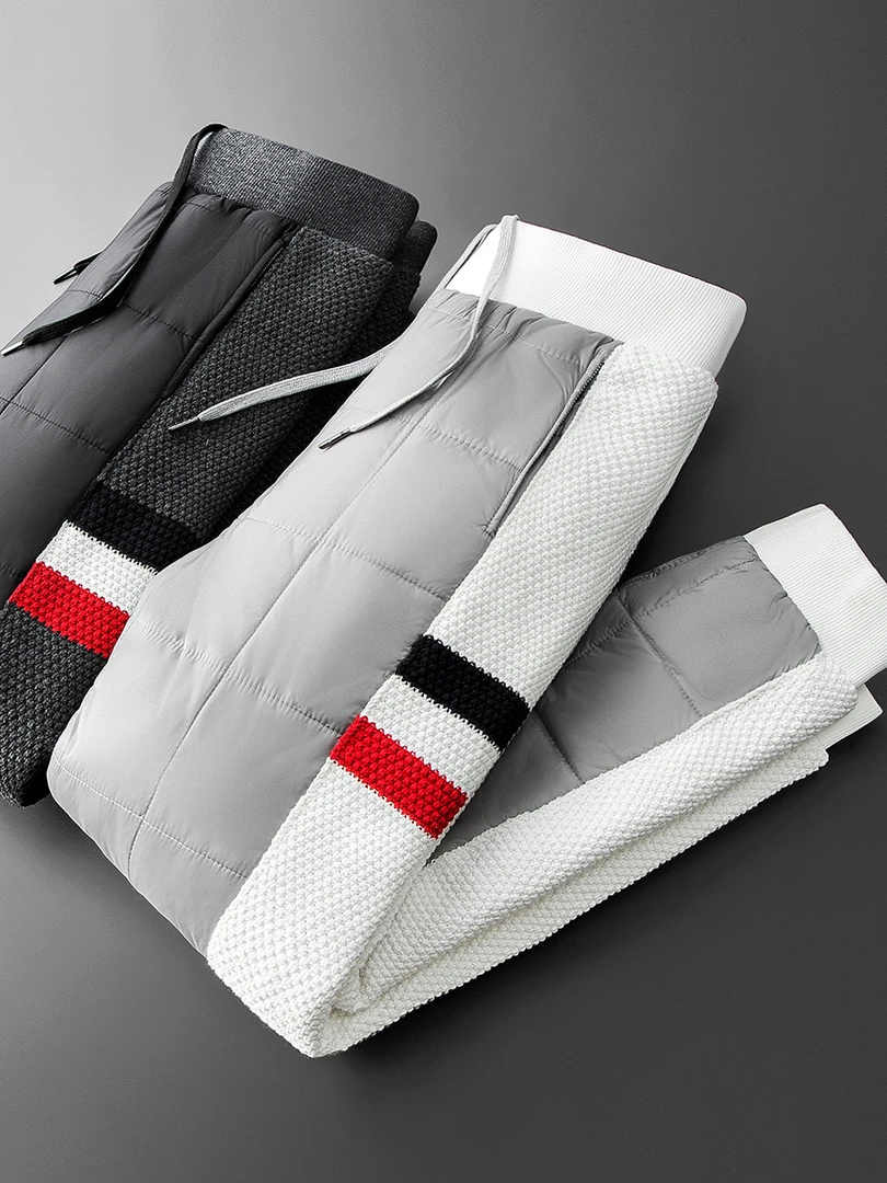 冬季御寒保暖加厚羽绒棉裤帅气针织拼接显瘦男士小脚外穿休闲棉裤