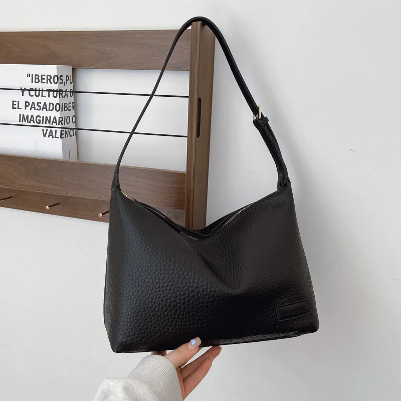 轻奢托特包简约风拉链暗袋单肩包休闲黑色肩包斜跨夏季通勤包韩版