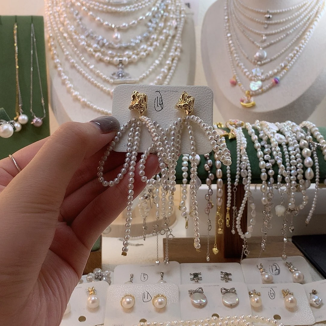 淡水珍珠银S925镶嵌耳饰