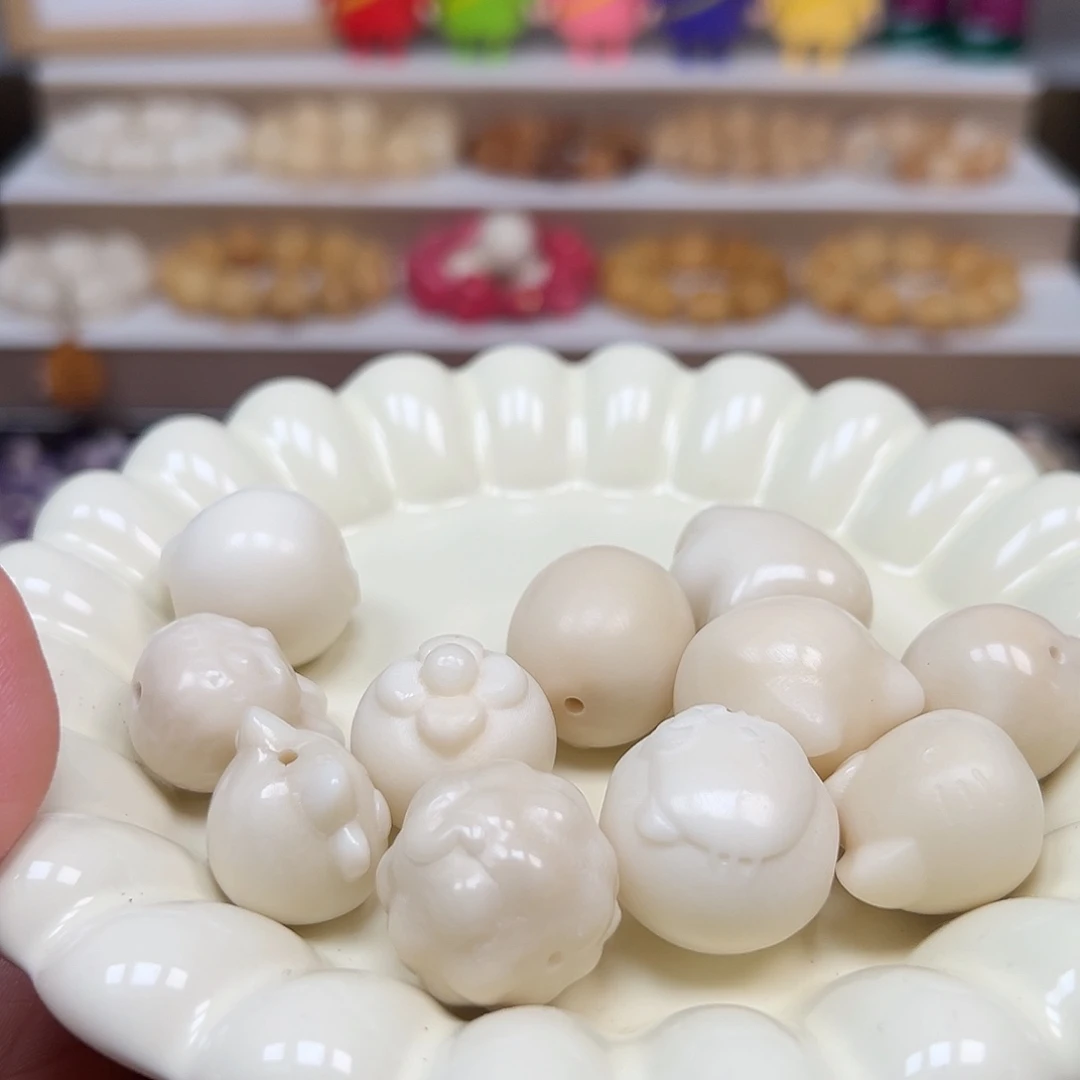 不***财手串菩提根/象牙果瑕疵牙果白混11颗有裂