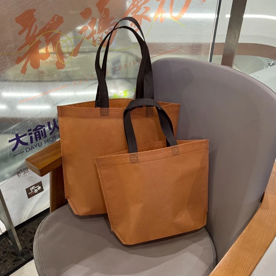无纺布袋定做服装店手提袋子印刷logo男女装童装店订制购物袋印字