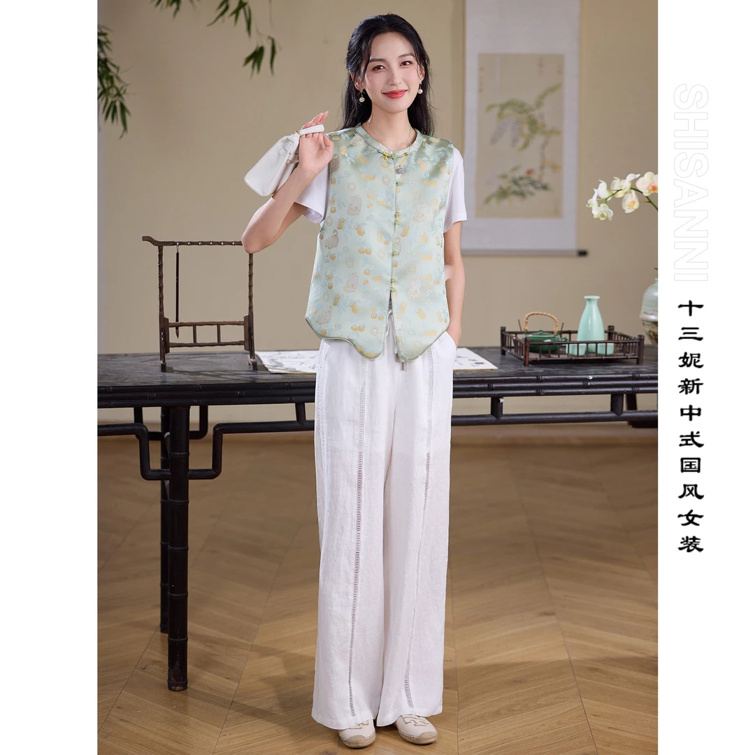十三妮亚麻蕾丝拼接镂空直筒裤新款春夏国风松紧腰系带白色休闲裤