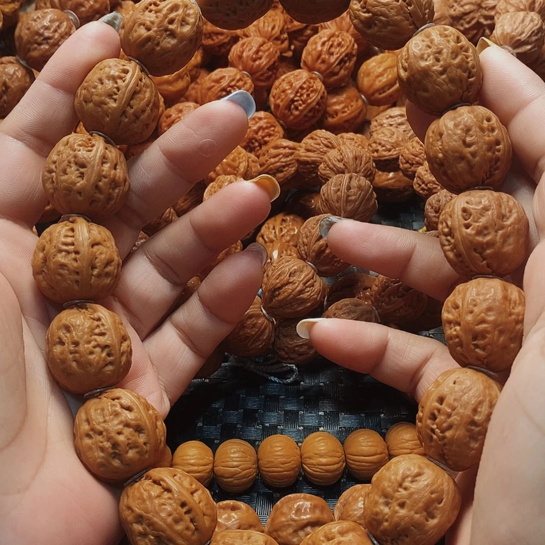 文玩核桃吊坠光头