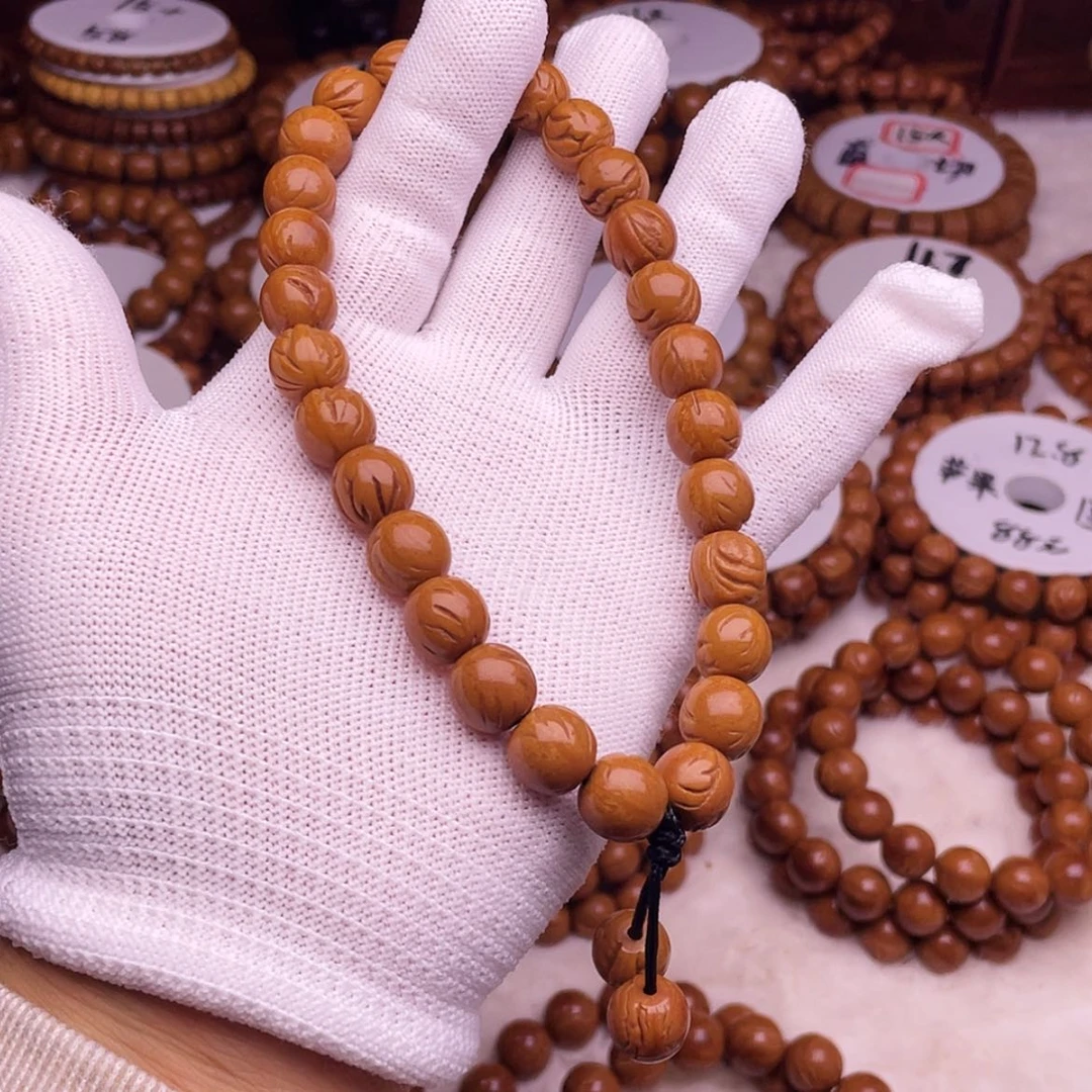 【闪购商品】桃核吊坠11.2龙纹老型桃核手持