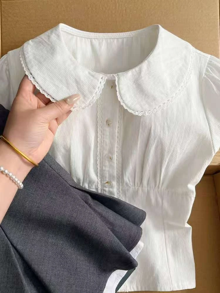 2025新款简约文艺风白色娃娃领衬衫设计感蕾丝边百褶裙裤两件套女