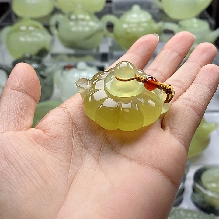 乌***哥未镶嵌蛇纹石玉手把