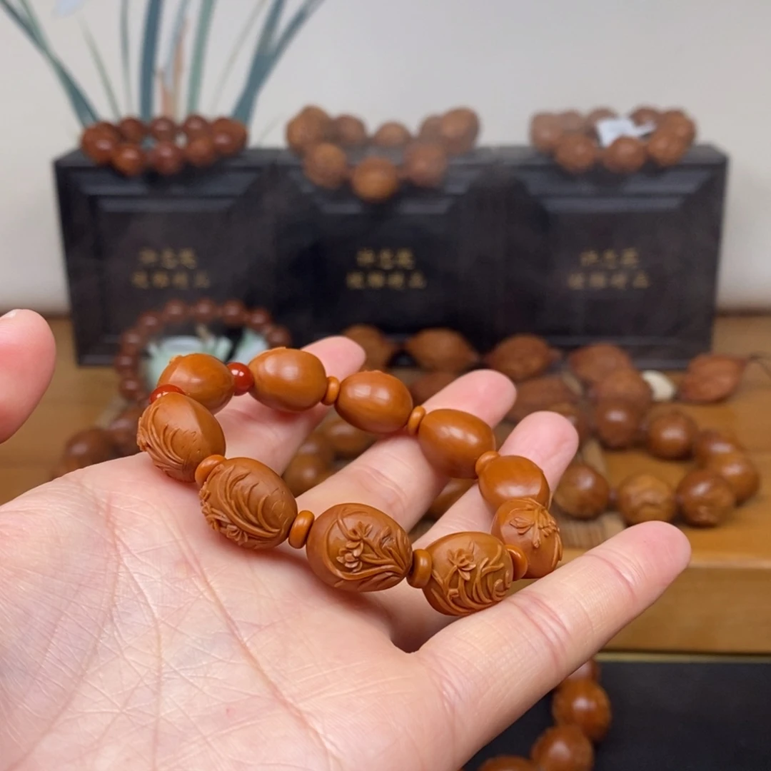 手串橄榄核曹华老师兰花