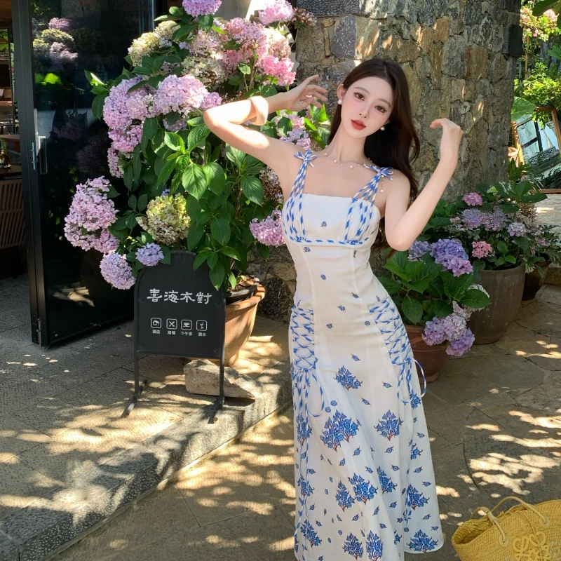 新中式千金风海边度假双绑带气质收腰吊带连衣裙女夏印花显瘦长裙