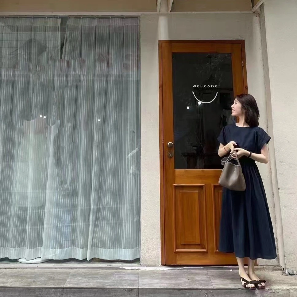 韩系高腰气质连衣裙女2025新款夏后背纽扣设计感简约休闲长裙
