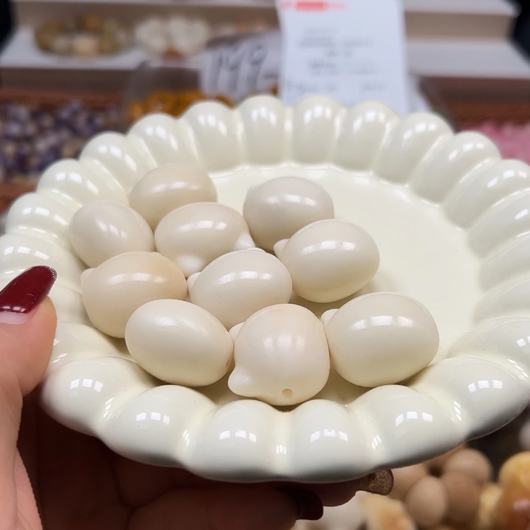 手串菩提根/象牙果瑕疵白无脸猫头10颗表面孔道有裂
