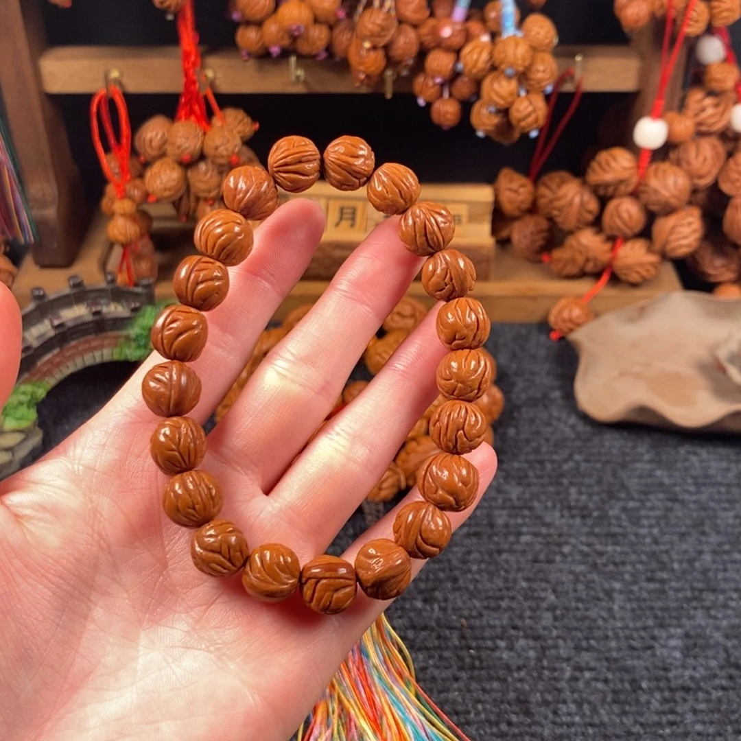 吊坠桃核桃枭手串