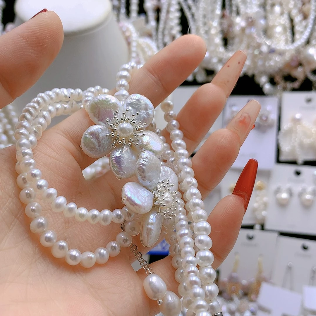 银S925镶嵌耳饰淡水珍珠章*哥