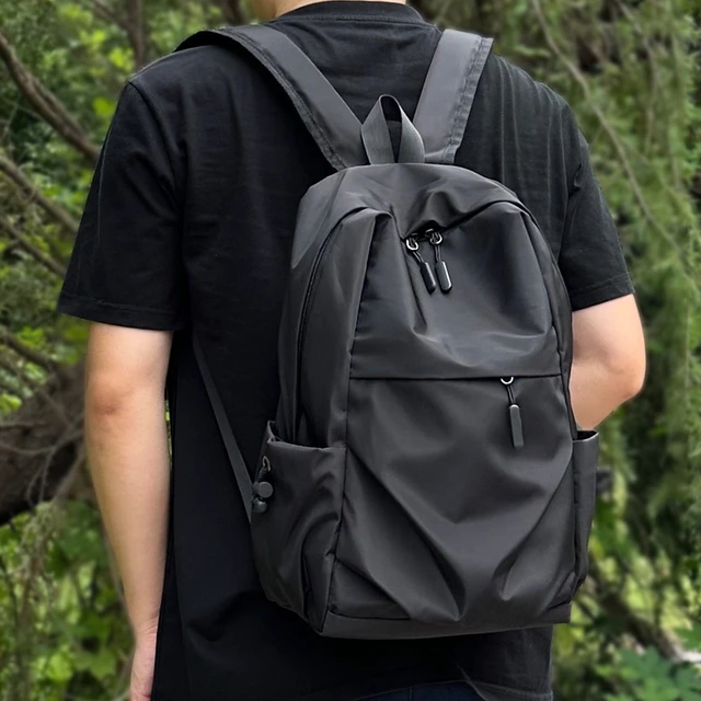 2025新款大容量双肩包男女轻便出游背包潮流大学生书包休闲轻舒适