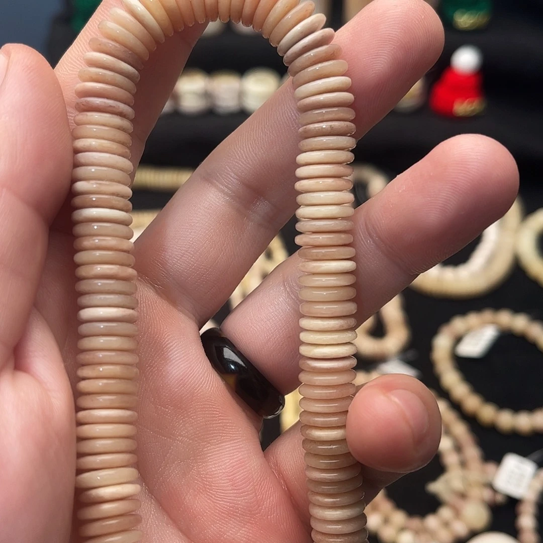 精品驼骨黄透手持