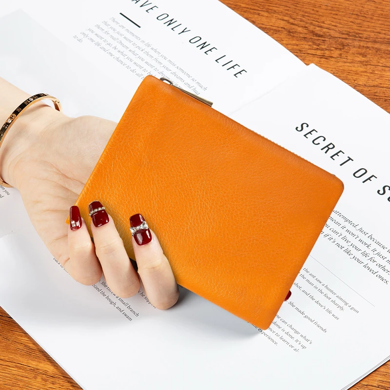 男女通用超薄便携里外真皮两折钱夹双大钞位纯牛皮折叠短款小钱包