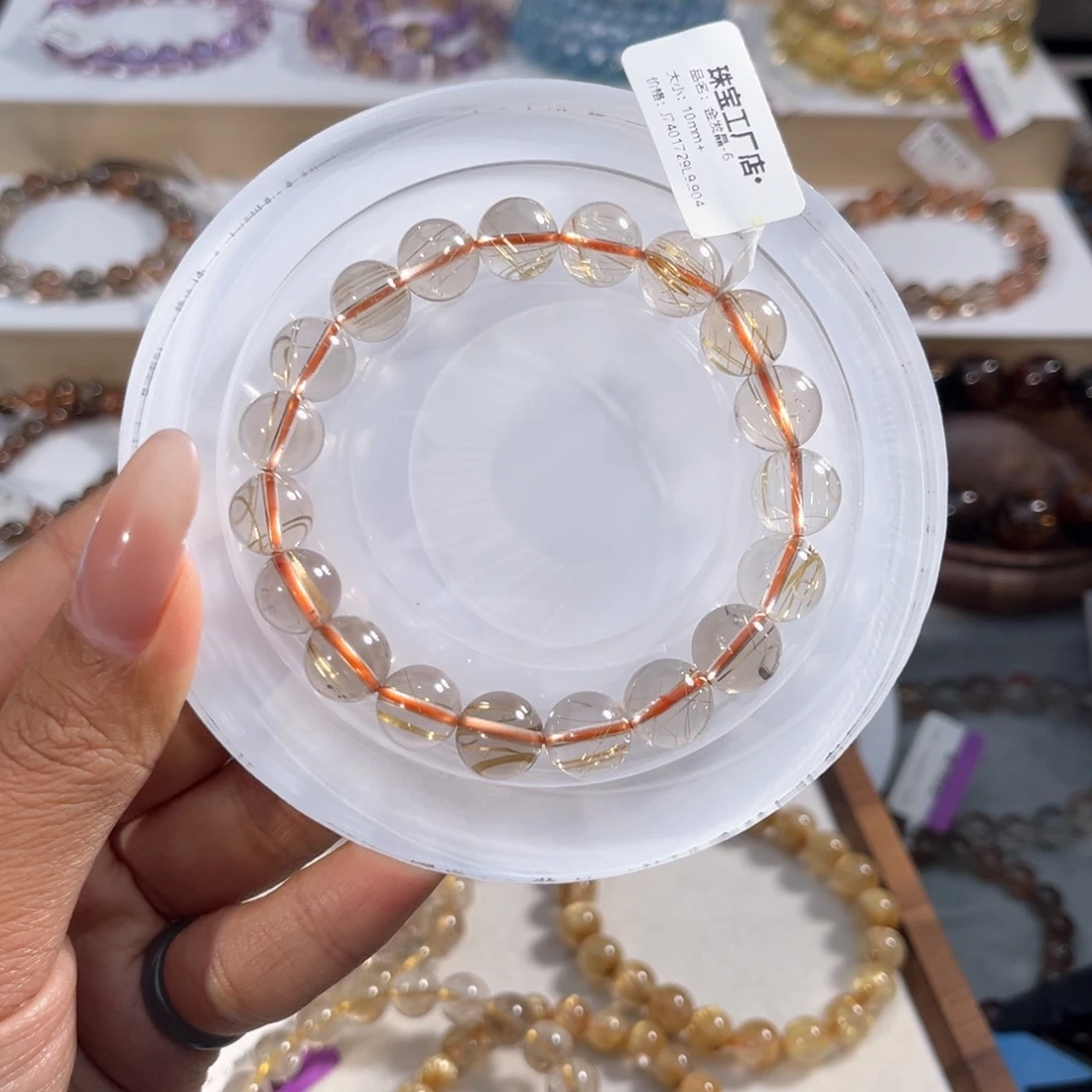 褚***嬴未镶嵌手串水晶金发晶10m