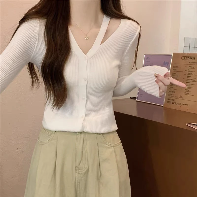 127 设计感扣子针织开衫