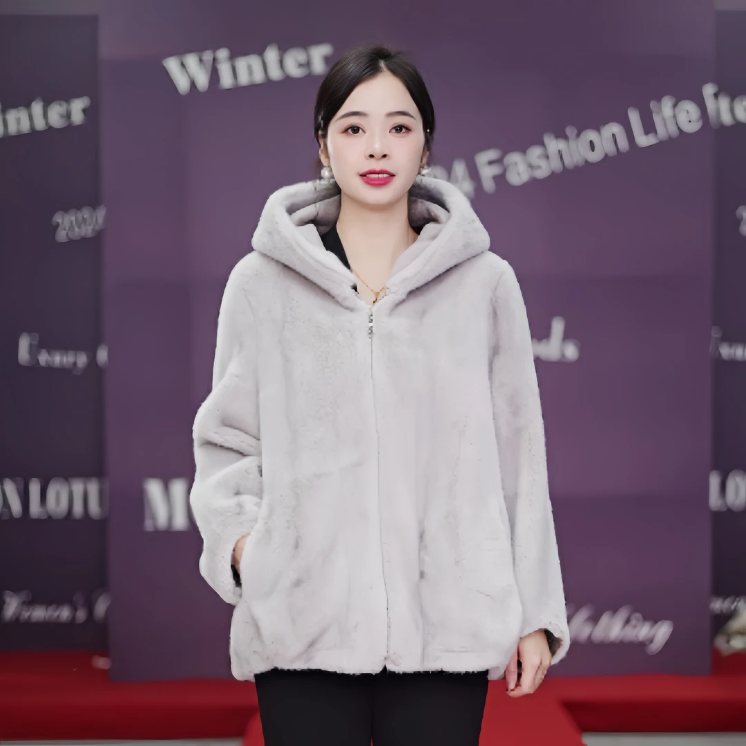 2024冬季海宁高端时尚气质女士设计师轻奢保暖中长款外套  1091