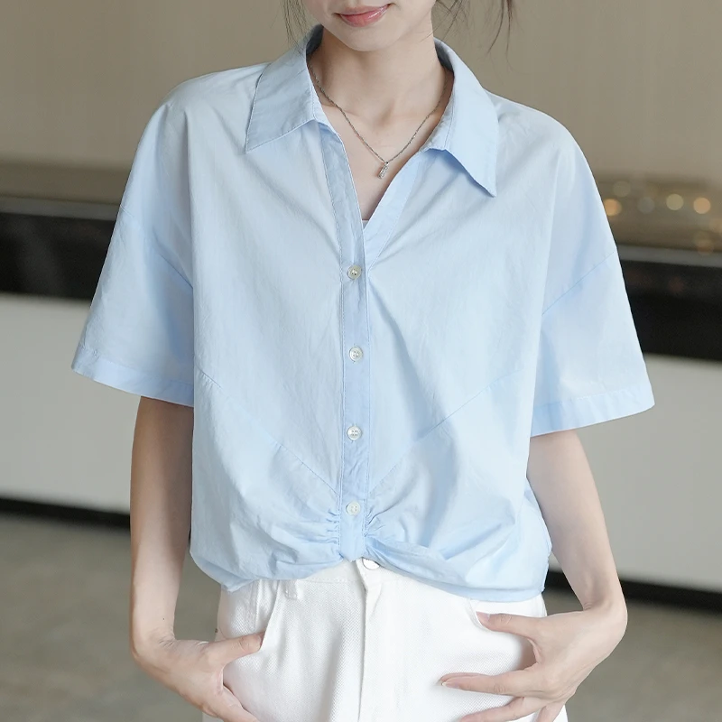 蓝色扭结短袖衬衫女2025夏季新款韩版宽松显瘦小个子短款衬衣上衣