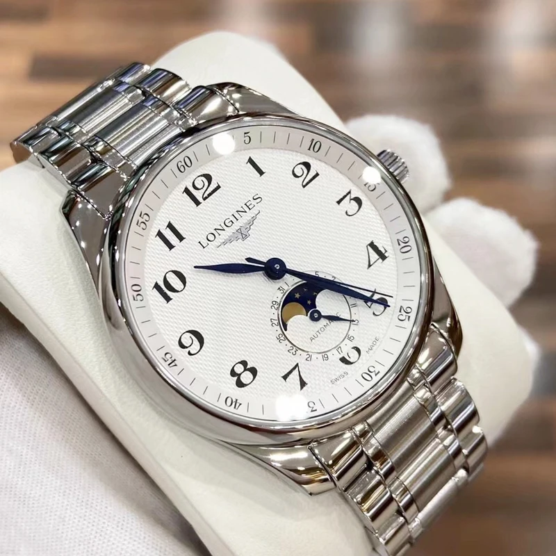 99新 Longines/浪琴 单表名匠系列四针月相40mm白盘钢带经典男款