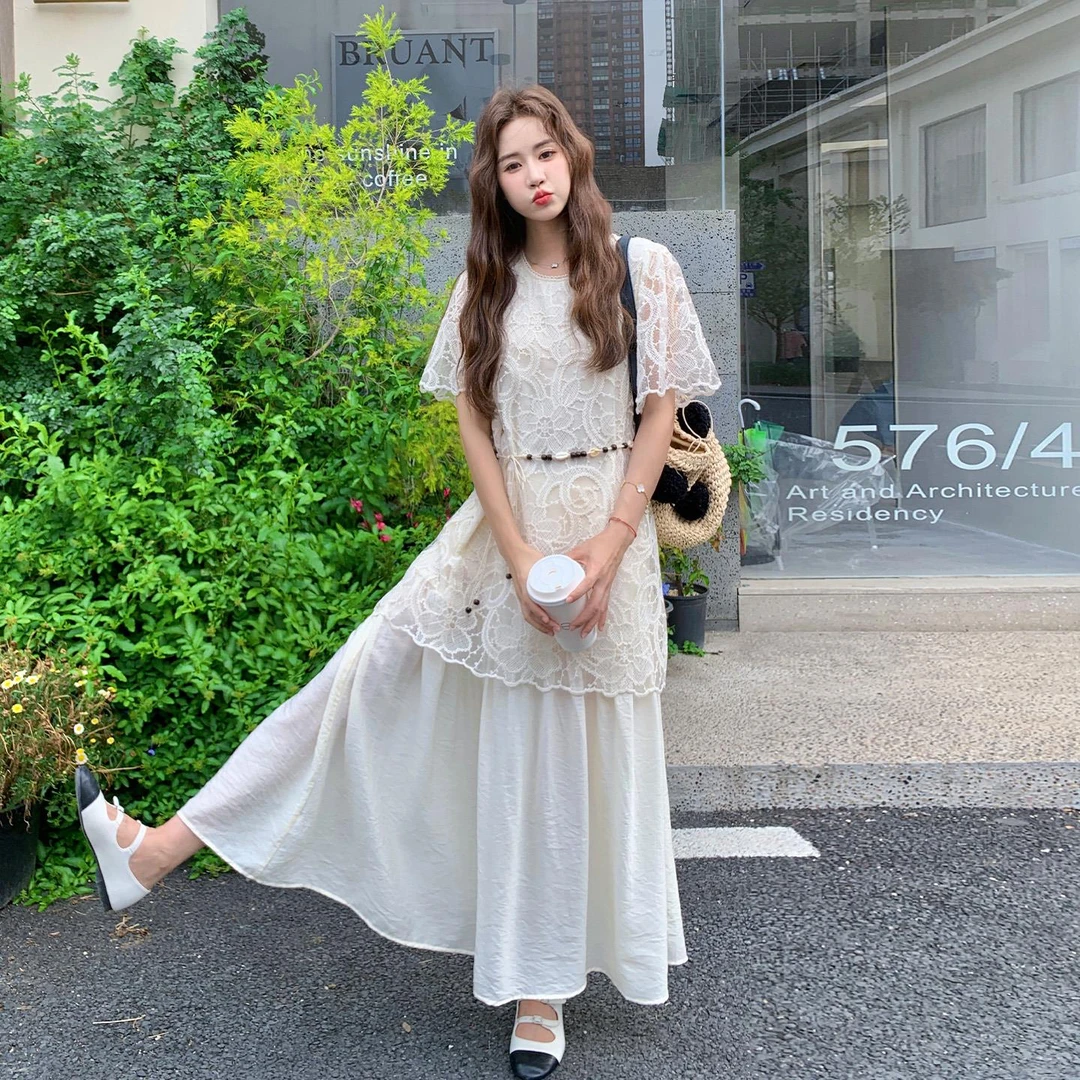 白色高端精致蕾丝绣花连衣裙女2025夏新款法式假两件洋气减龄长裙