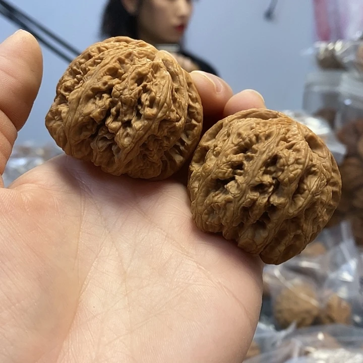 愤***鸟文玩核桃把件45.5/46粗筋