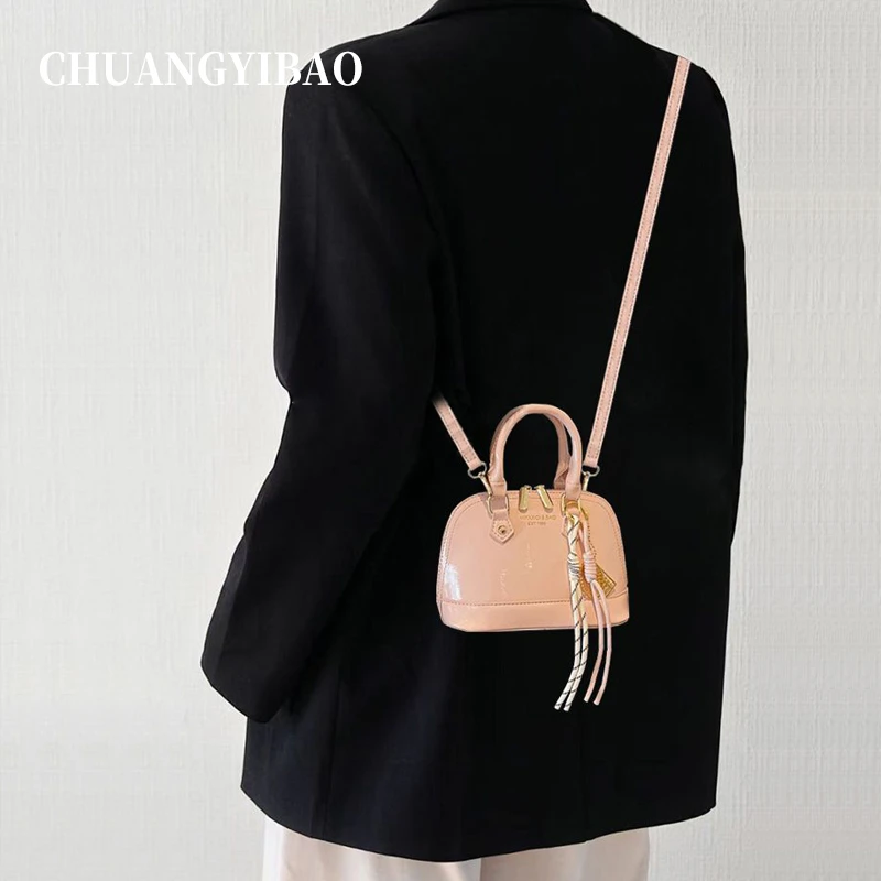 粉色超火贝壳小包包女式2025新款韩版小众设计高级感斜挎包小拎包