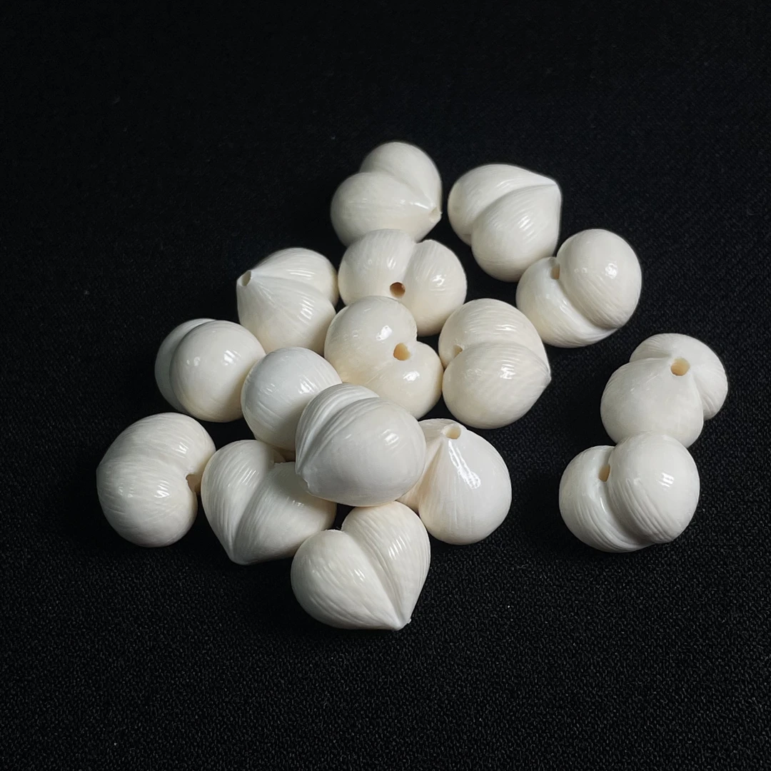 A122 屁桃 只做天然猛犸牙 尺寸约12*14mm
