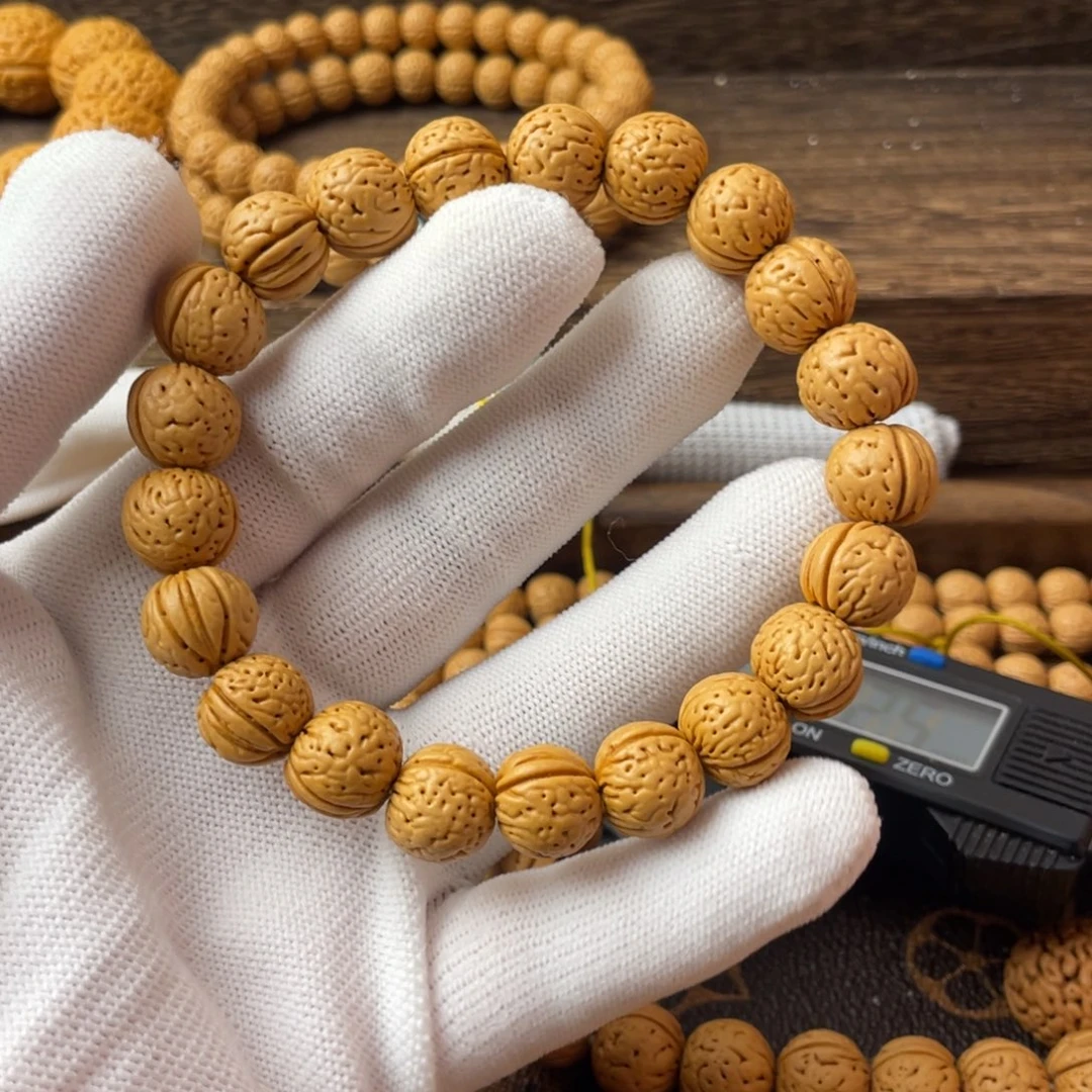 吊坠桃核金丹手串