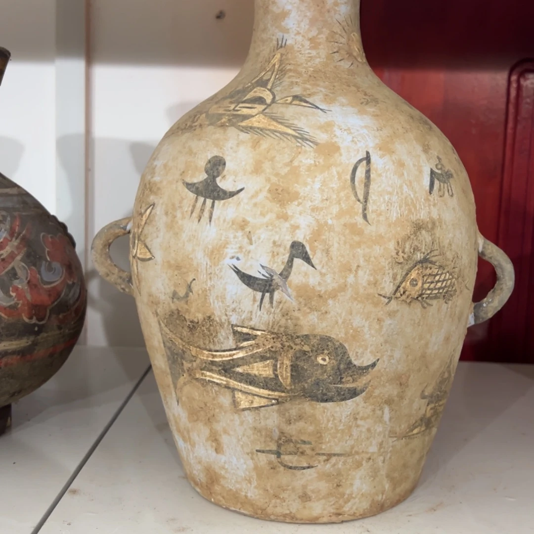 青***机彩陶带天文图案罐