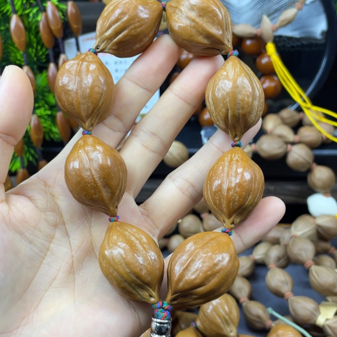 君***下吊坠橄榄核001铁头核2.5