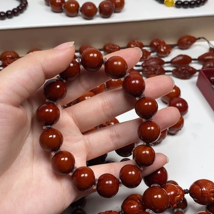 亮***恼橄榄核雕刻工艺的发展