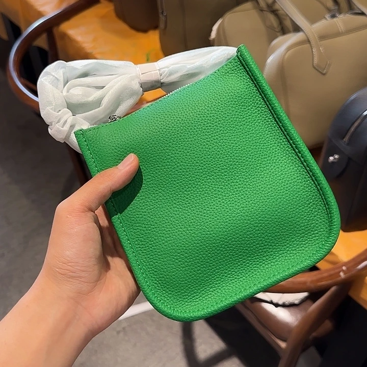 小***子聚酯纤维手工牛皮包