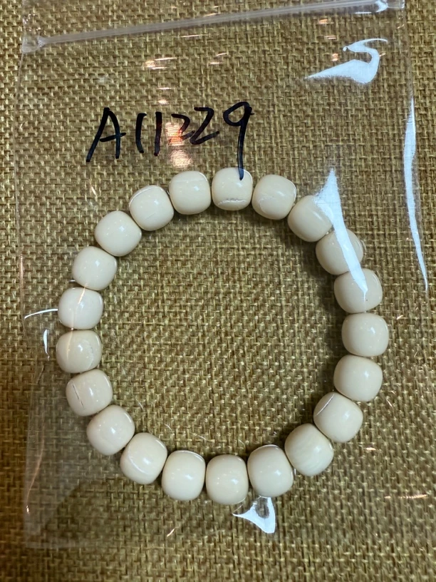A11229猛犸牙老型手串配饰瑕疵