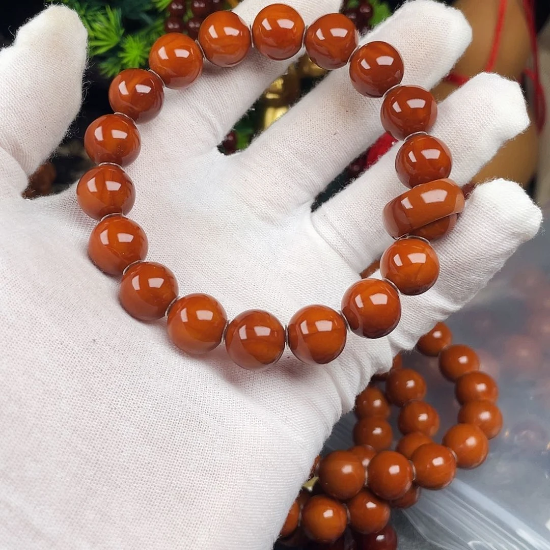 橄榄核手串桔***?1.25小红核