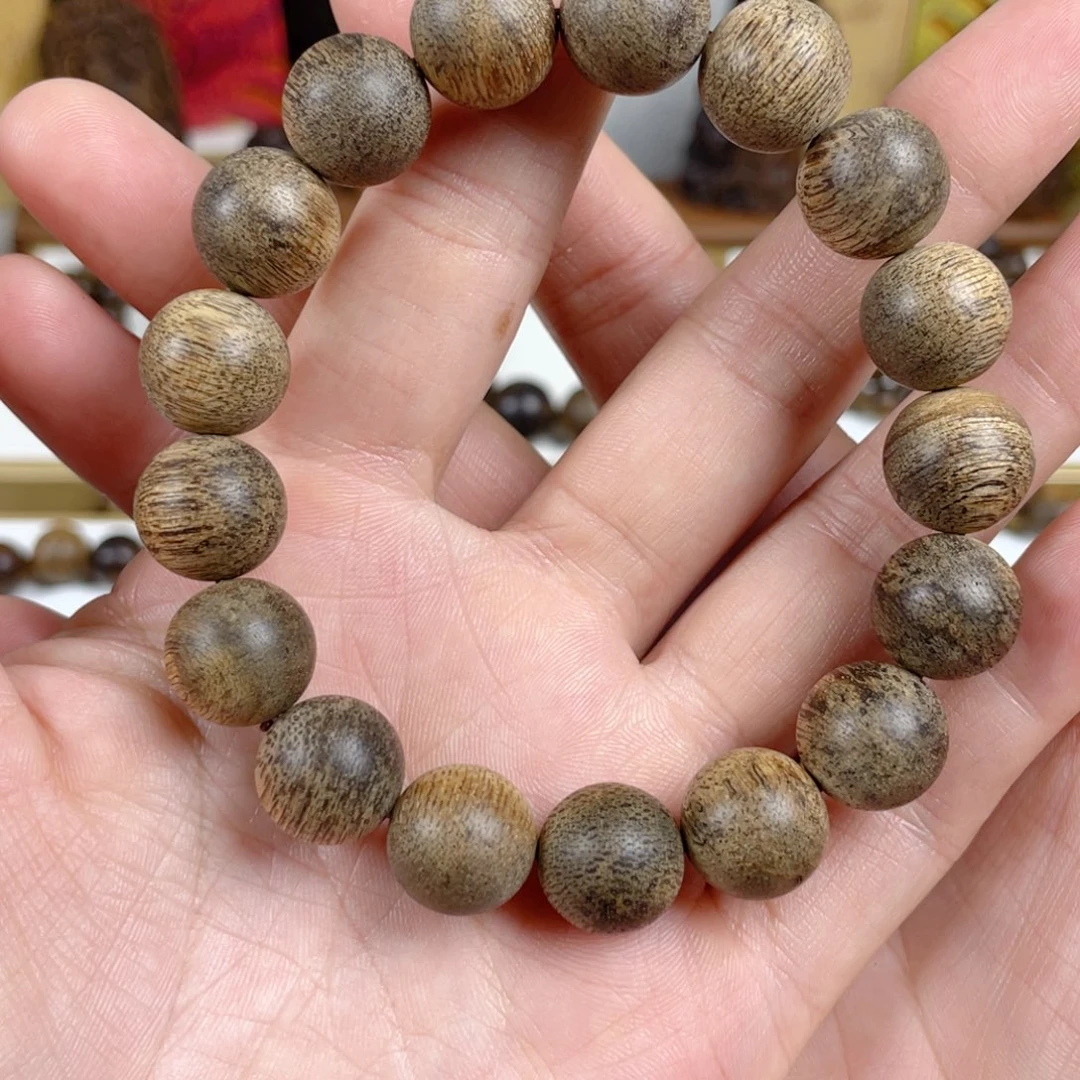 沉香手串亮菩萨棋树心老料1.3