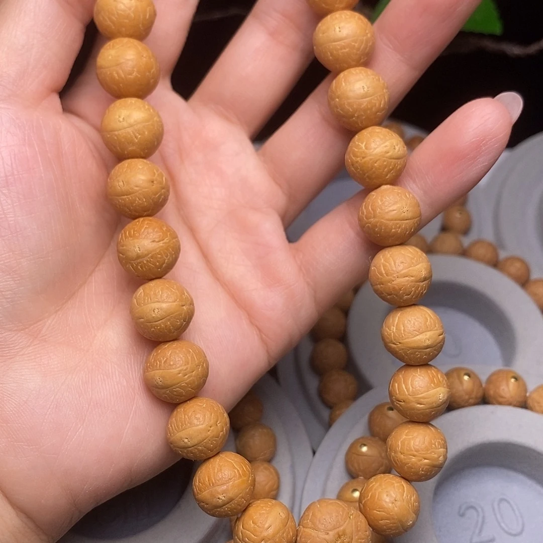 蔡***战凤眼菩提吊坠手持