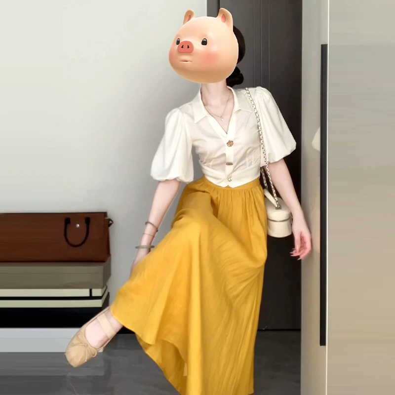 4050法式显瘦气质黄色半身连衣裙子女2025设计感白色衬衫长裙套装