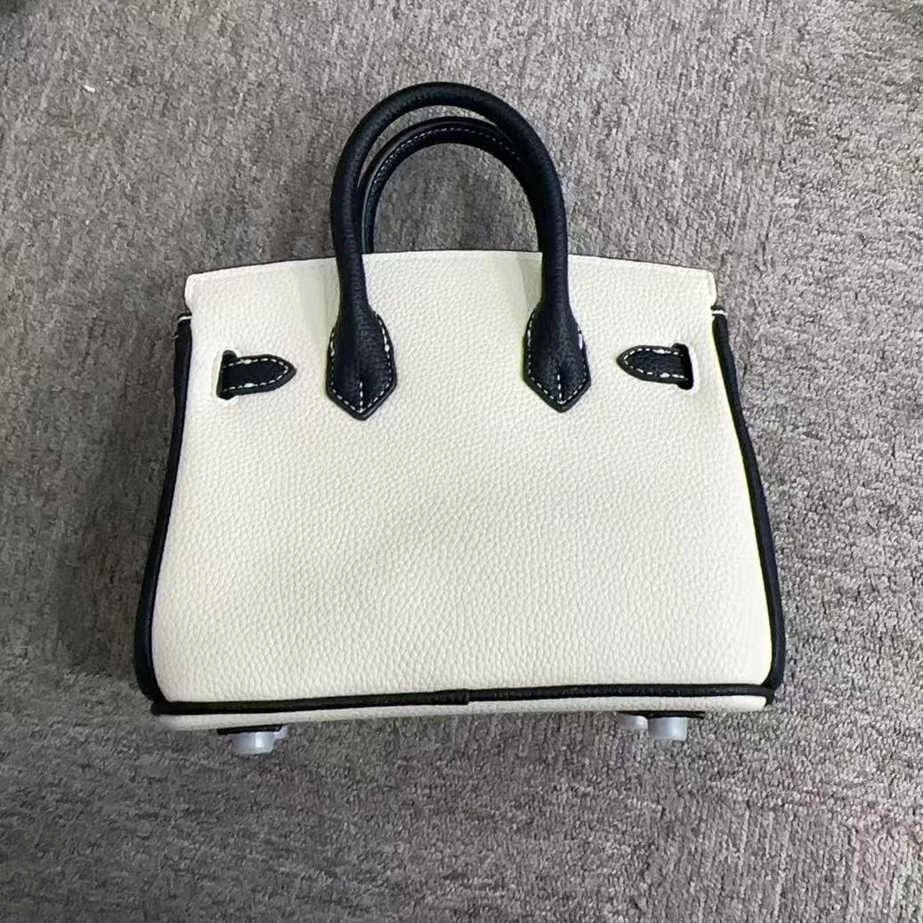 2025新款真皮女包双手提白拼黑色7720