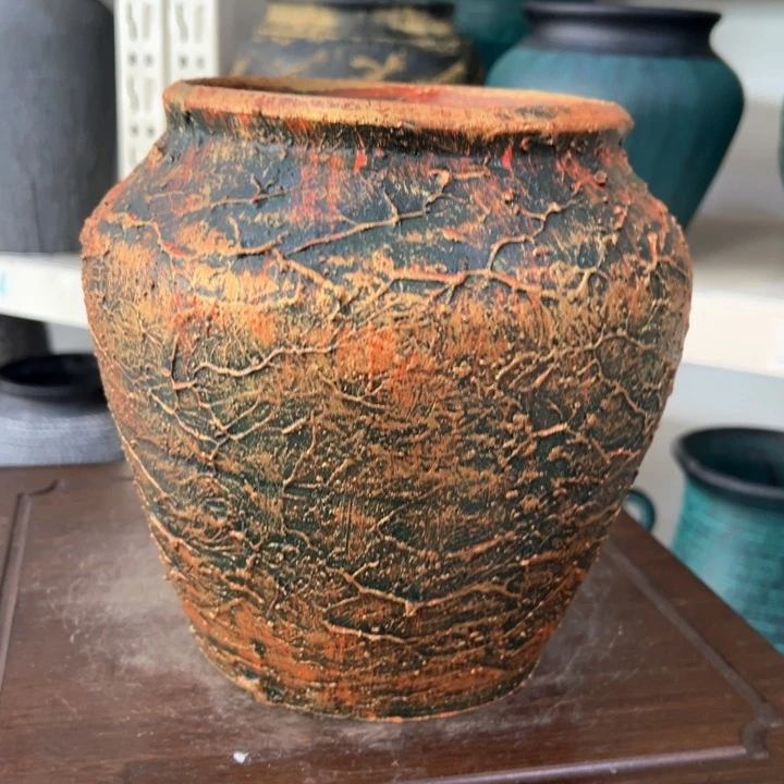 16.9-1微瑕土陶30红浮