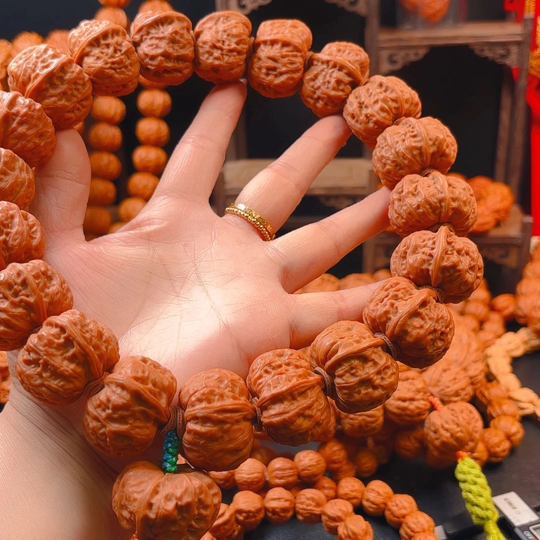 文玩核桃吊坠涡**阀核桃手持