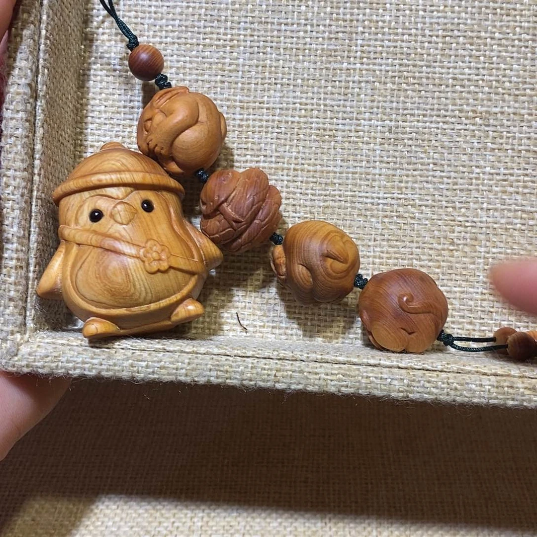 木爱****?崖柏手把件，小企鹅