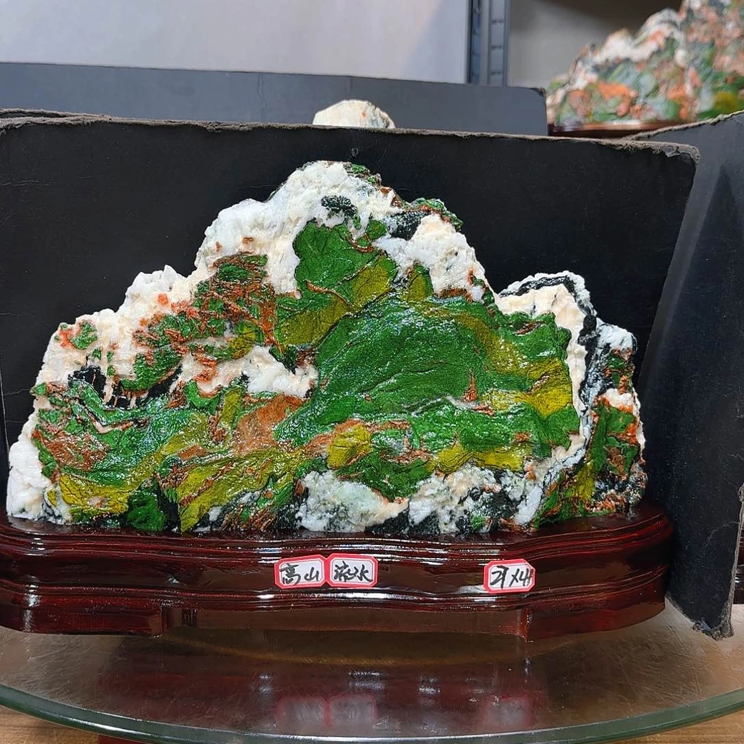 崇***然陶瓷青海七彩石石头摆件