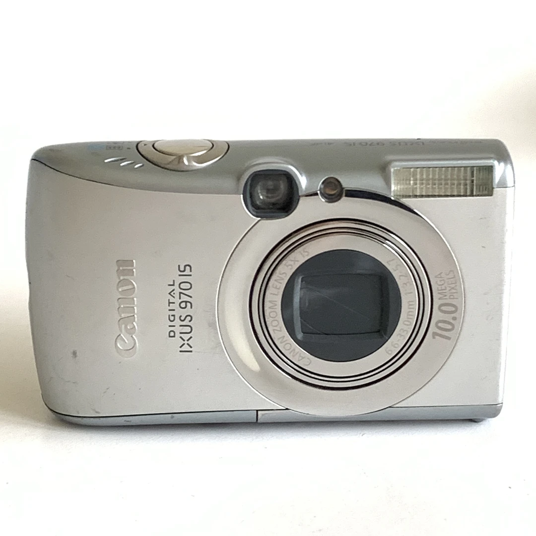 95新 Canon/佳能 ixus970银1000w像素出片色彩感好人白景浓